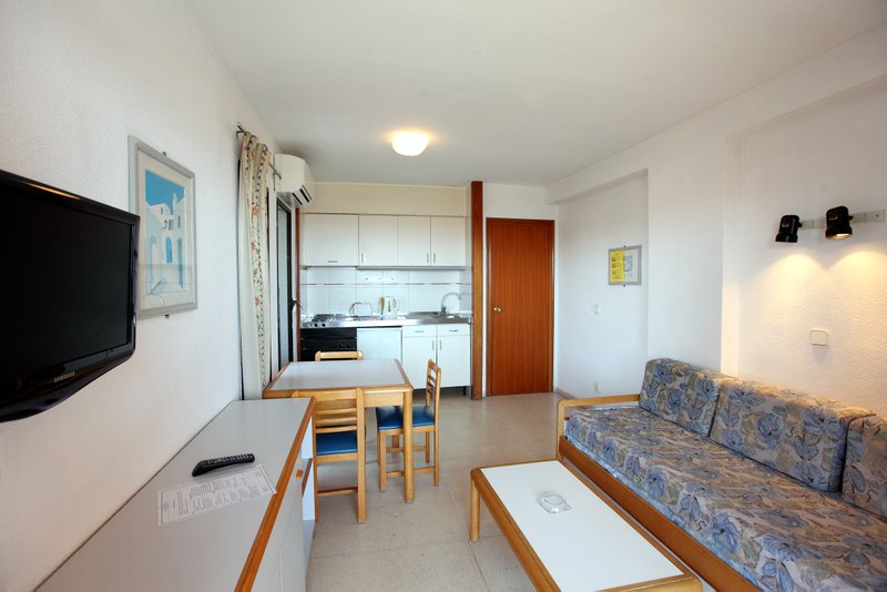Living room with kitchen apartments La Caseta
