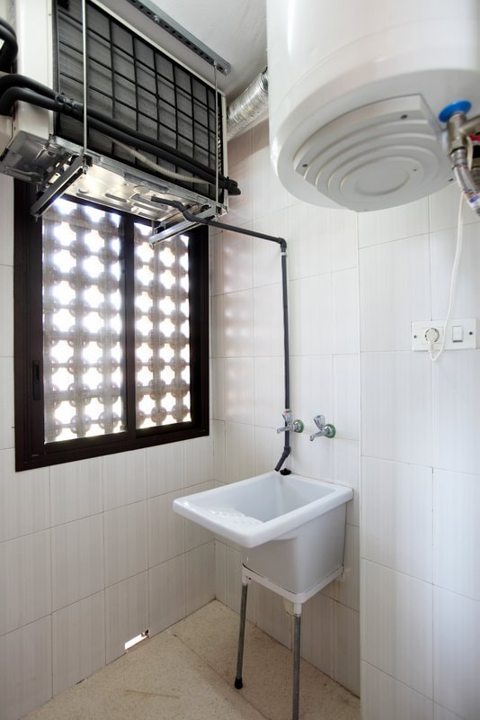 Bathroom with bathtub in La Caseta Apartments