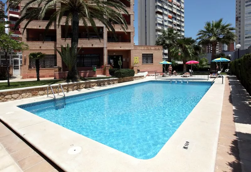 Swimming pool with garden areas